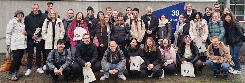 students pose in front of a building at FH Muenster