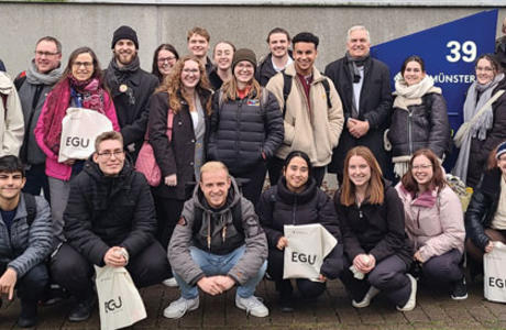 students pose in front of a building at FH Muenster