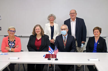 Faculty and staff representing the University of Minnesota pictured after the signing of an agreement with the National School of Public Health in Cuba (ENSAP). 