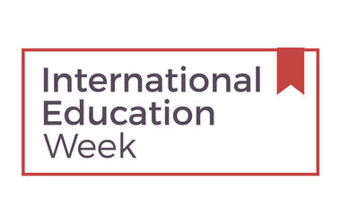 logo with ribbon and words international education week in red