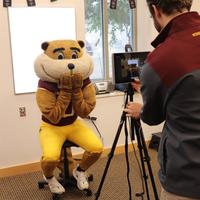 Goldy Gopher poses for a passport photo